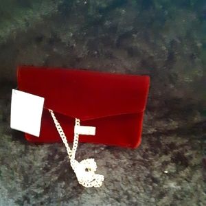 Jimmy choo crossbody with chain is gold